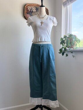 Upcycled Blokette Champion blue sweatpants with lace trim